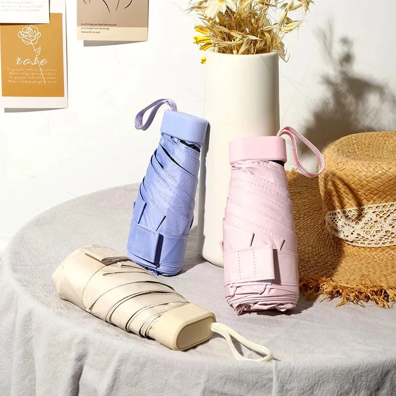 ☀️☔ Mini Capsule Umbrella – Ultra-Portable, Rainproof & Sun Protective for Travel & Everyday Use! 🌦️✨