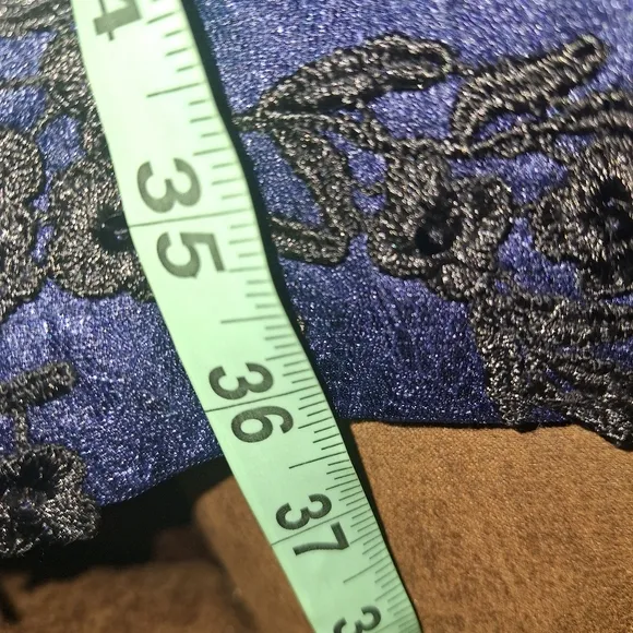 A Decode semi-formal long sleeve midi/maxi blue &amp; black dress in a size 16.NWT