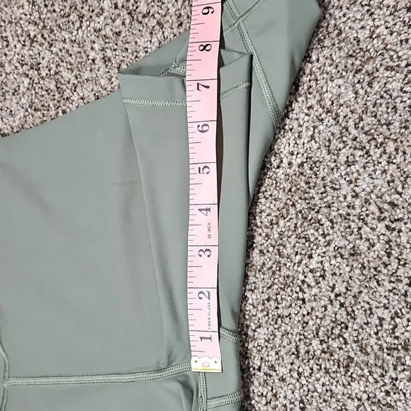 Athleta Ultimate Stash Pocket 7&quot; Short Size S Laurel Olive