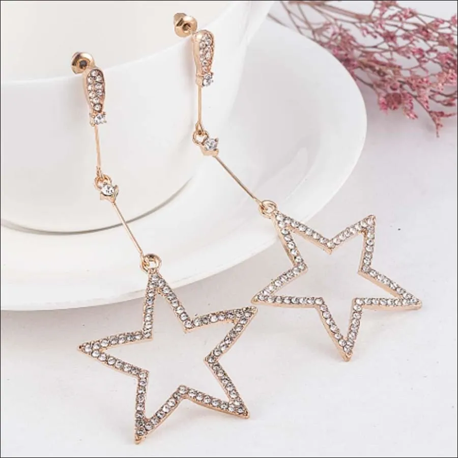 Golden dangling stars earrings