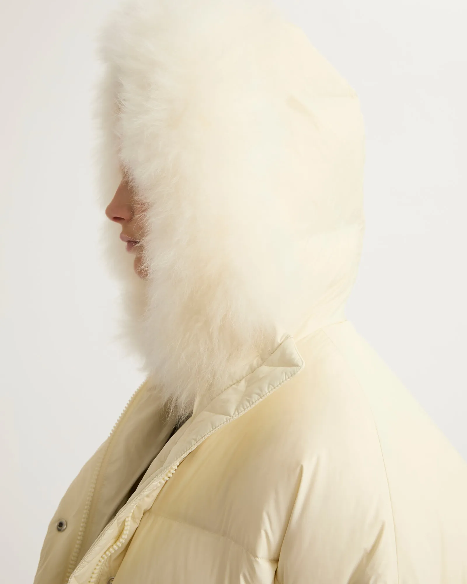 Hooded down jacket with fluffy lambswool trim
