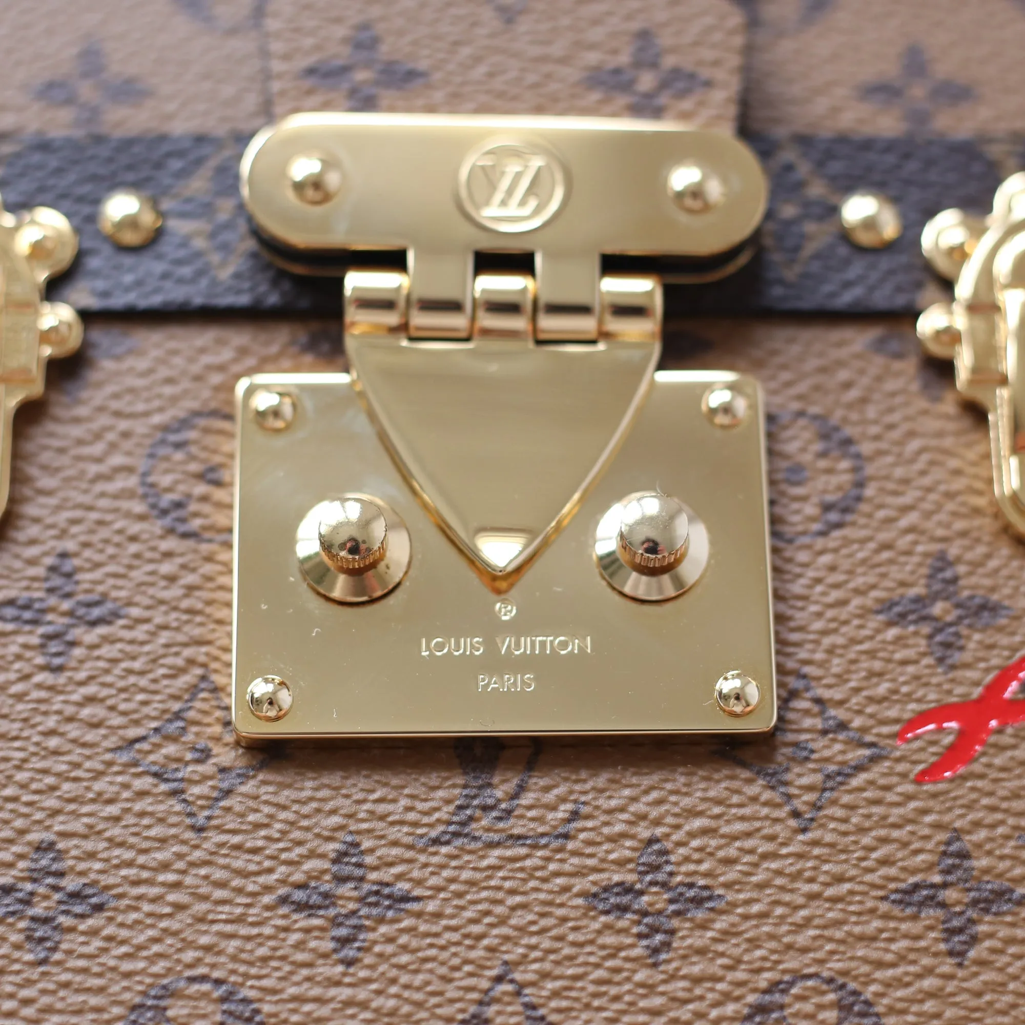 Louis Vuitton | Monogram Reverse Canvas Petite Malle | OS