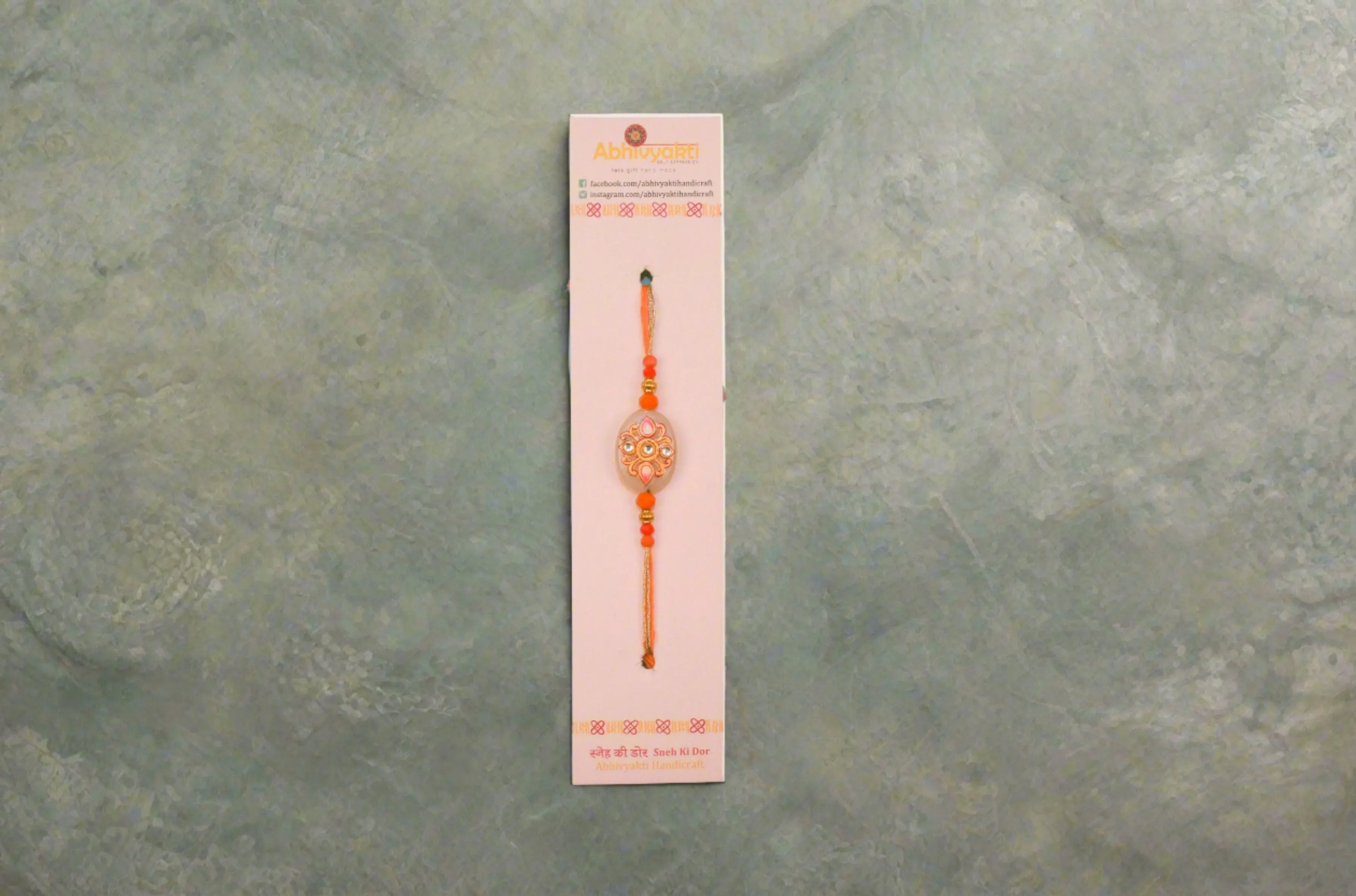 Orange Hand Painted Rakhi -Send to USA ( Free shipping )