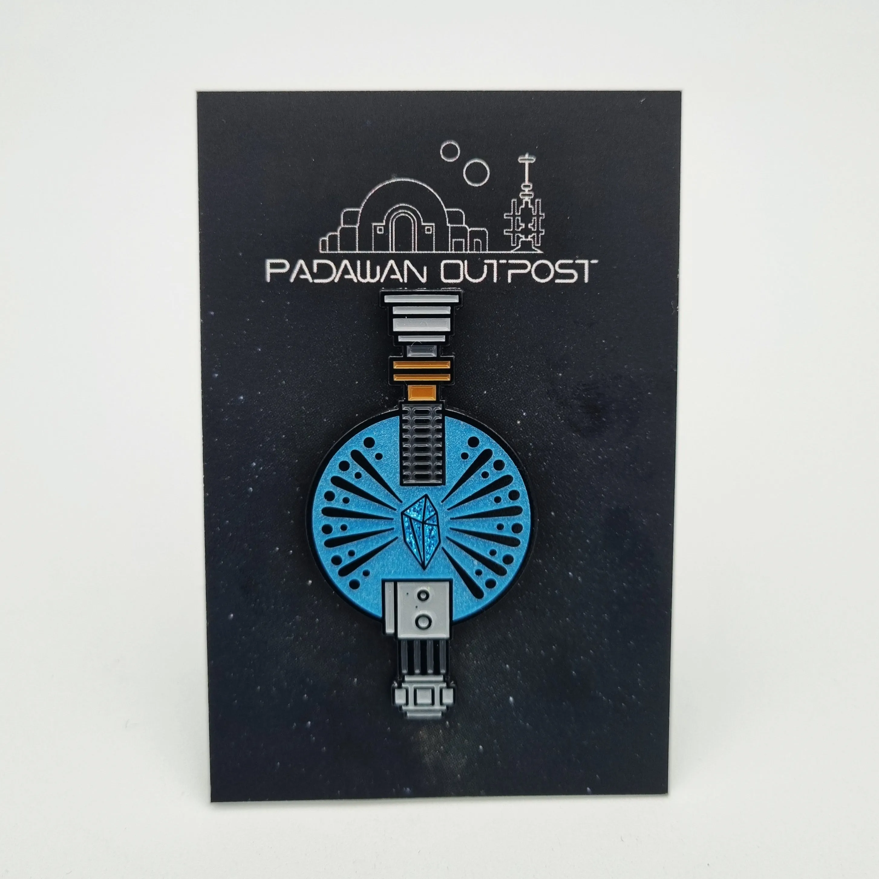 Saber crystal pin badge