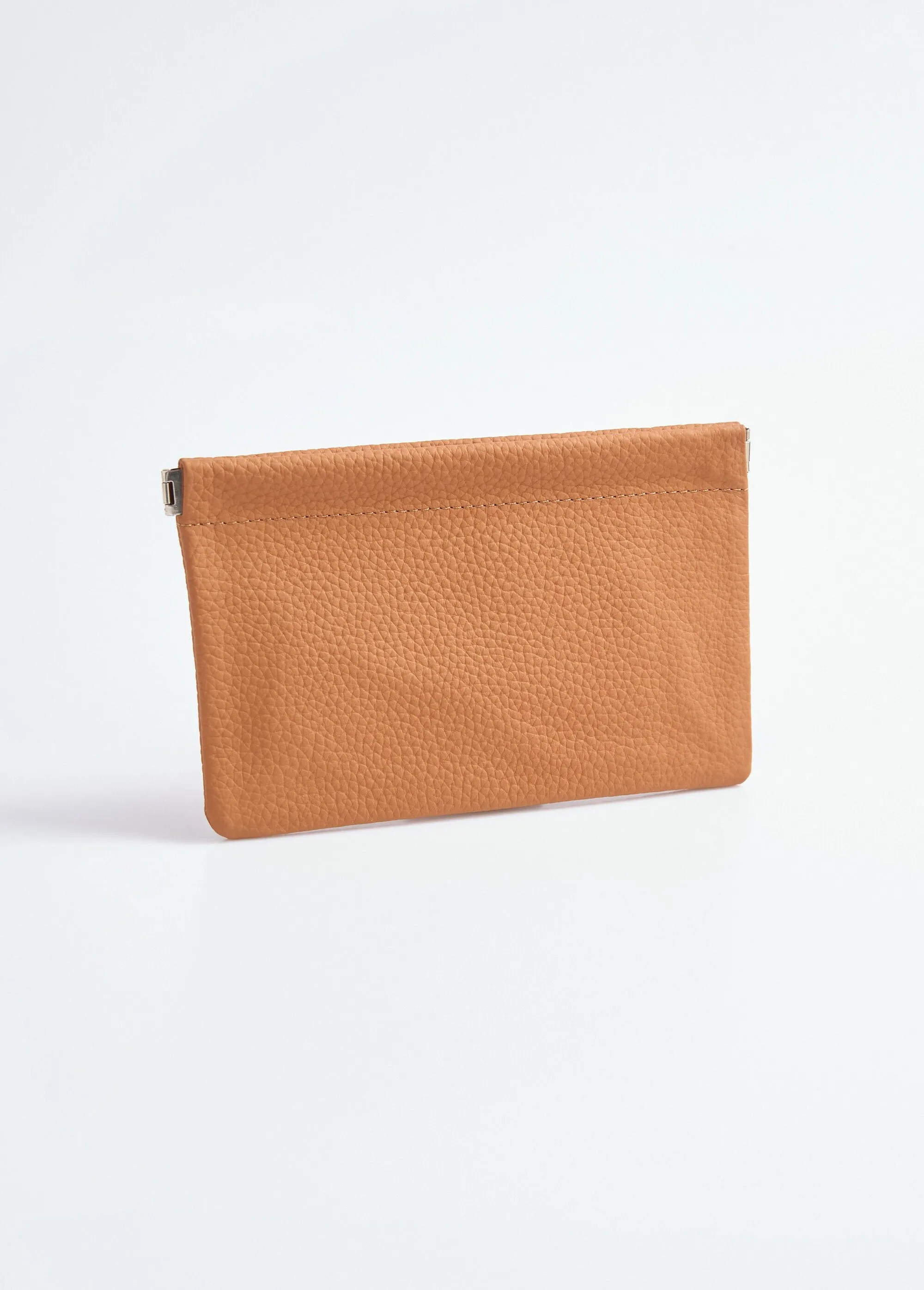 Small leather pouch with rigid closure