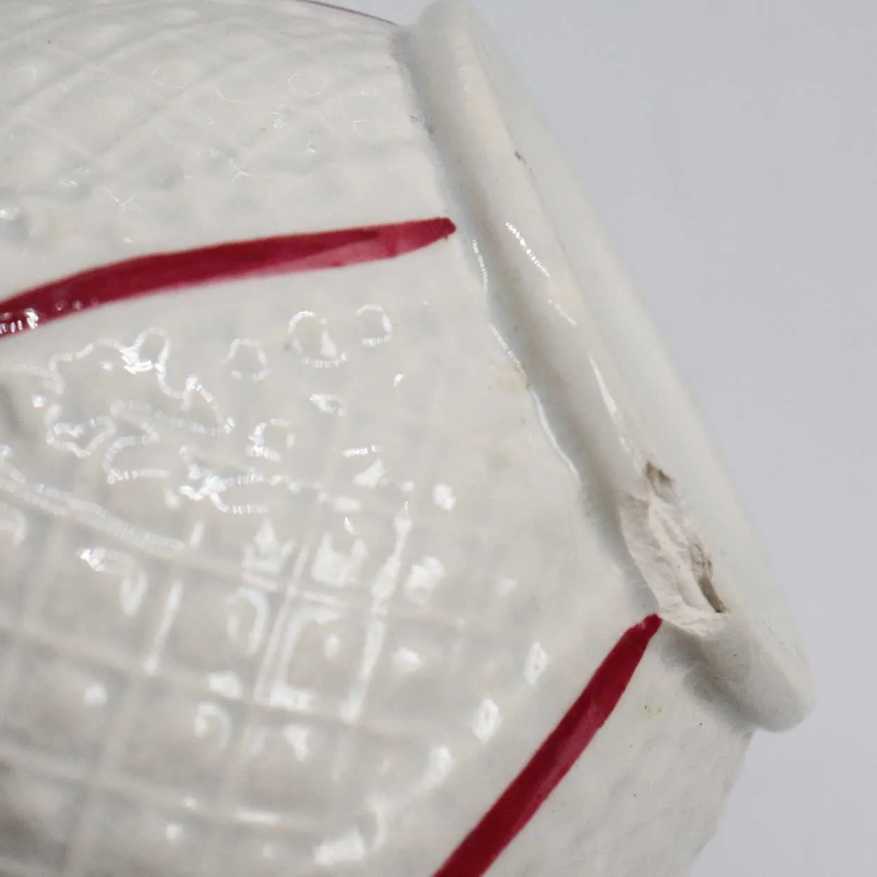 Small Moulded Pottery Red and Cream Glazed Creamer Pitcher