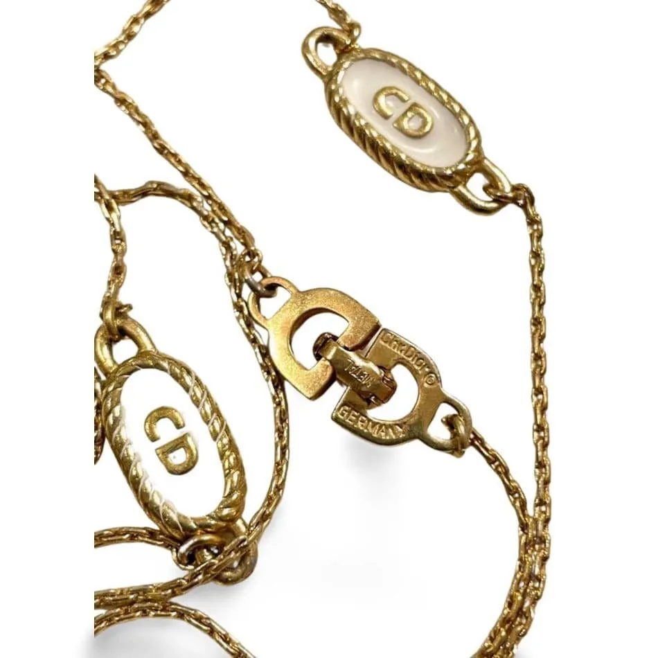 Vintage Christian Dior skinny golden chain necklace with gold and white oval CD charms. Classic Dior jewelry. Long necklace. 060130ac2